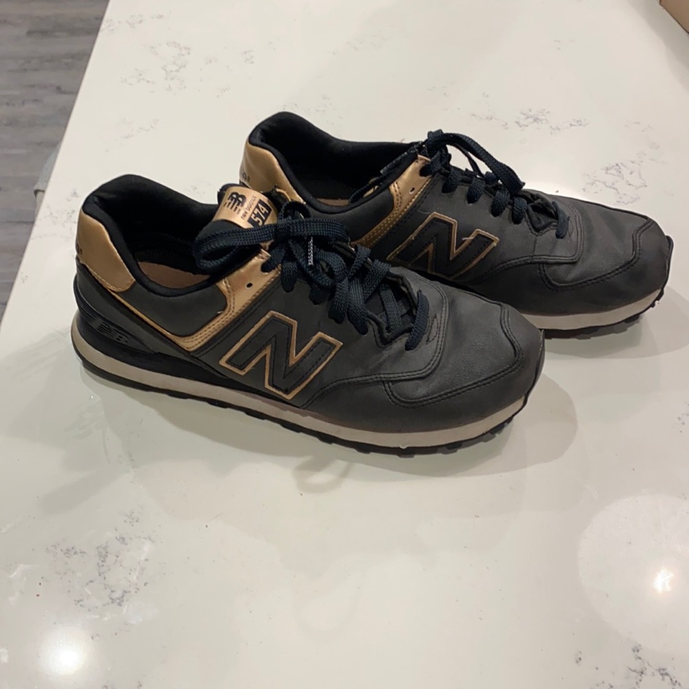 Rose gold and black New Balance 574